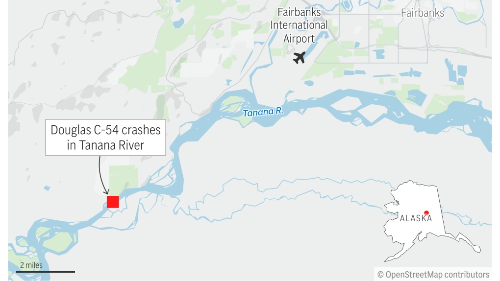 Douglas DC-4 carrying two persons crashes into river outside of Fairbanks