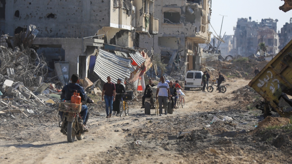 Palestinians return to Khan Younis following Israeli forces pullout