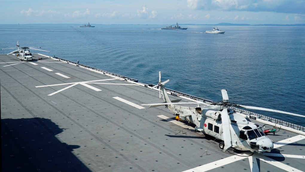 Two Japanese navy helicopters crash, leaving one dead and seven missing