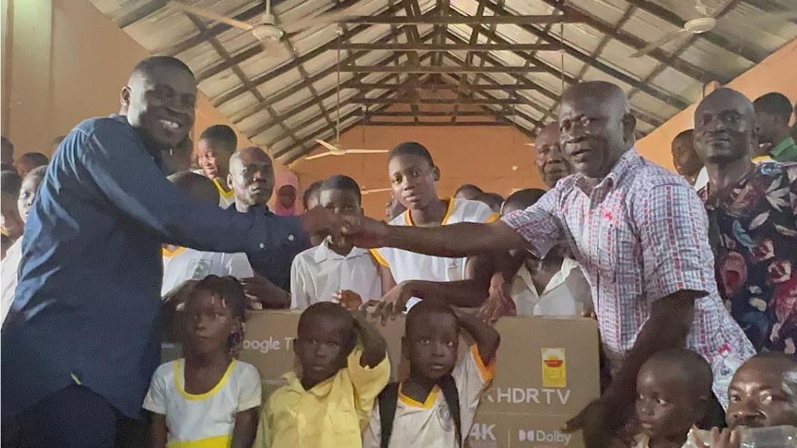 Joyce Bawa donates a smart TV to Akuse RC Basic School