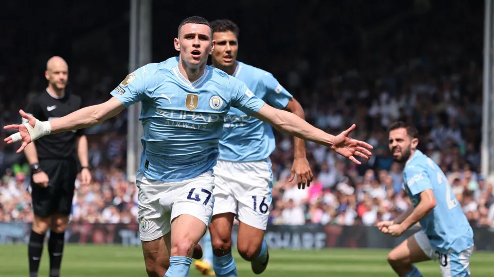 Man City chase Arsenal for title after Fulham win