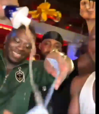 Video: Man washes cedi notes with Azul tequila worth GHS15k