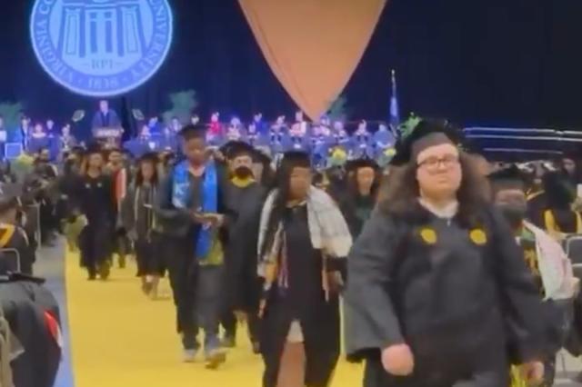 Students at Virginia Commonwealth University stage a graduation walkout over a speakers remarks