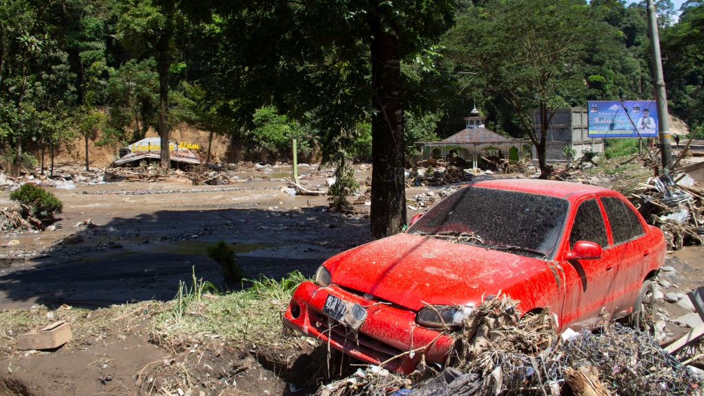 At least 37 people killed after floods and cold lava flow hit Indonesia