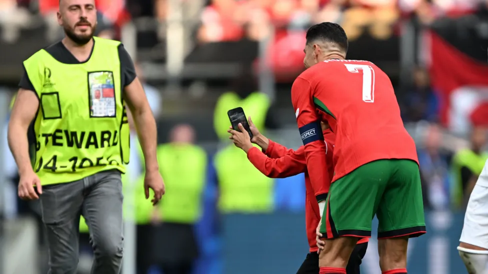 Euro 2024: Pitch invaders seek Ronaldo selfies, Martinez worried