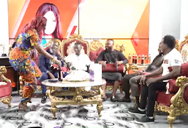 Watch Nayas brandish glass bottle on live TV