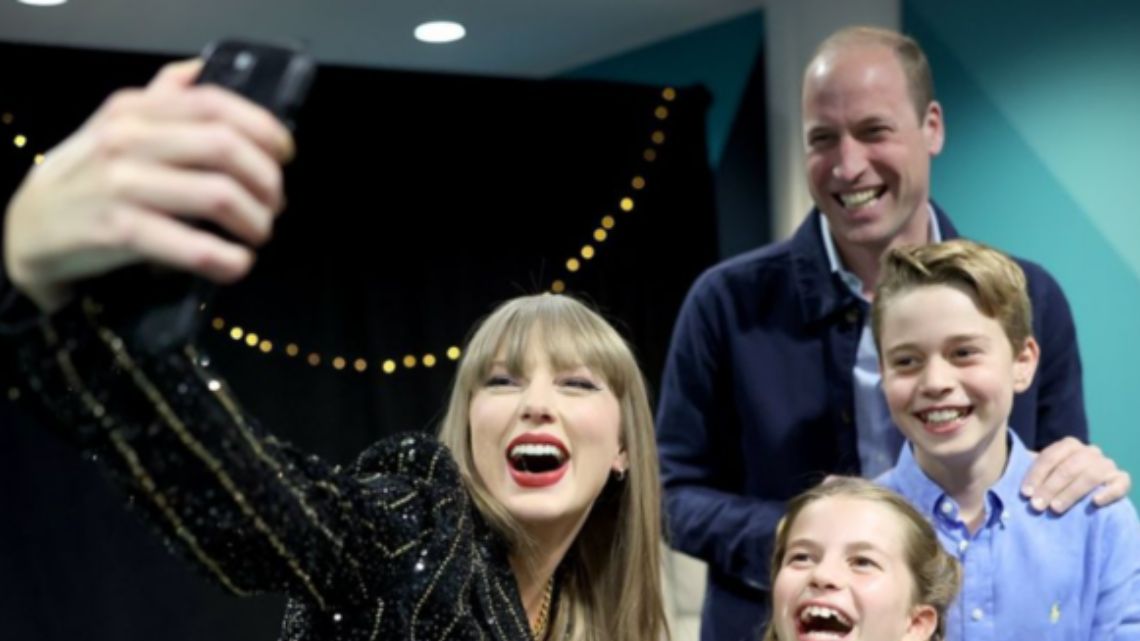 Pop star Taylor Swift takes a selfie with Prince William and his children