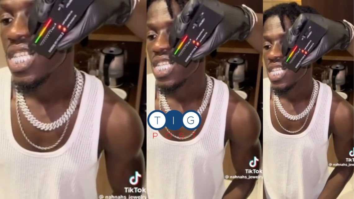 King Paluta displays his expensive diamond necklace