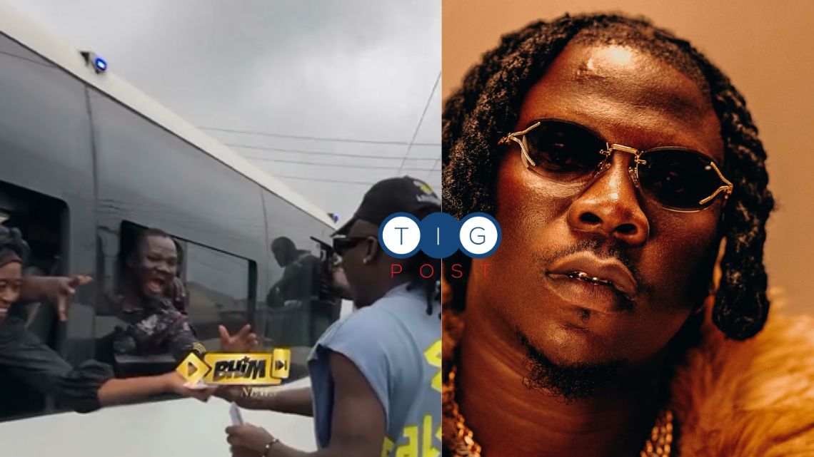 Video: Stonebwoy shares cash to soldiers in military convoy