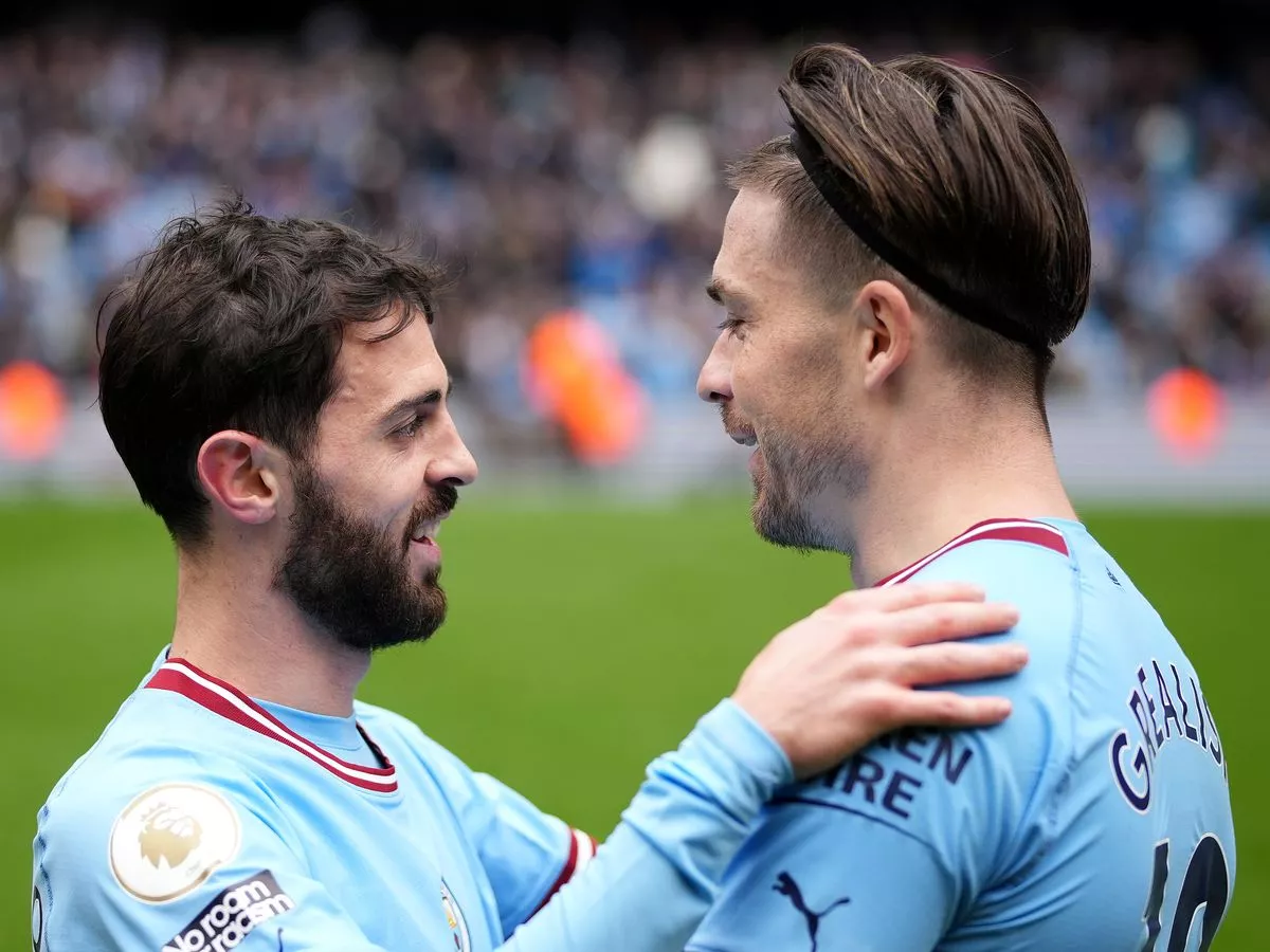 Jack Grealish jabs Bernardo Silva after Man City training