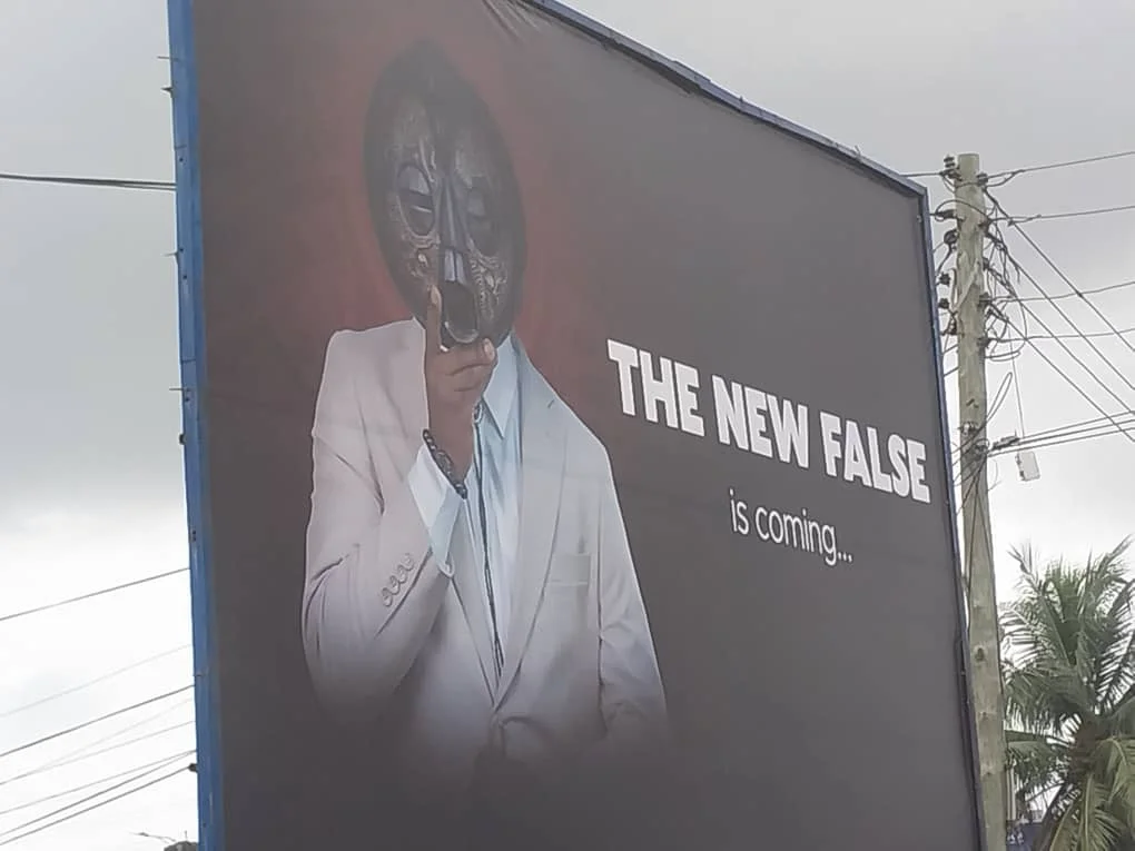 The New False: “Cheddar-inspired” masquerade billboard pops up, stirs intrigue
