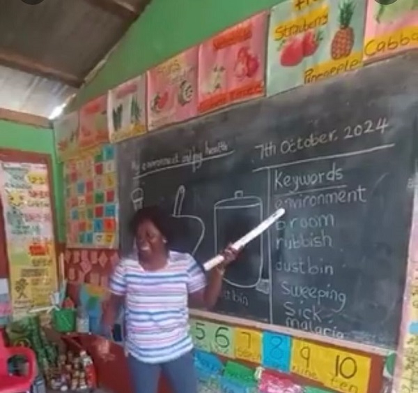 Watch a kindergarten teacher’s creative dance captivating students in a classroom