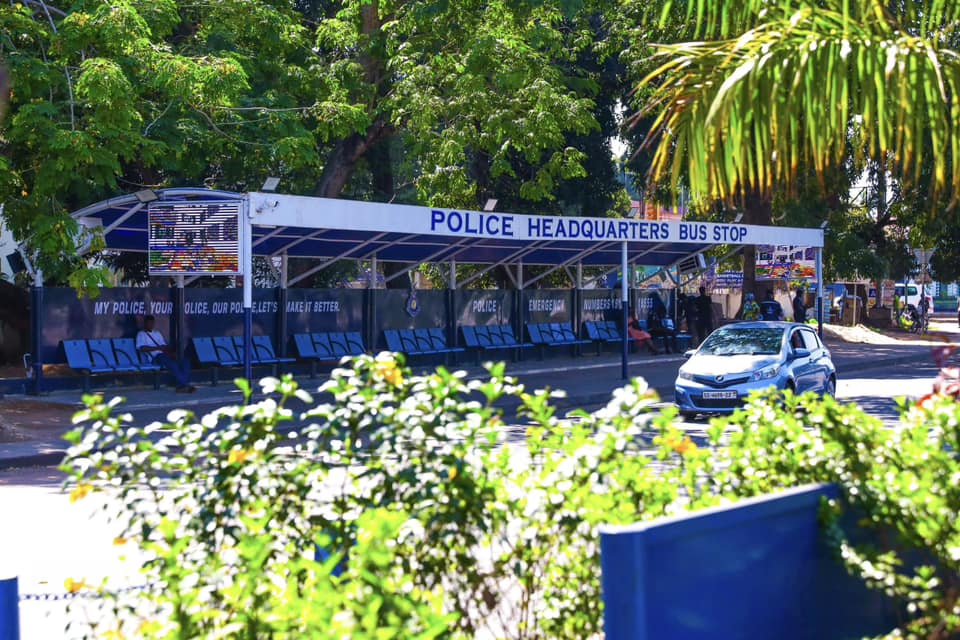 2 modern bus stops outdoored by Police