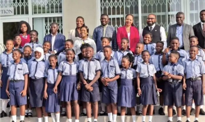 School children rally for peace ahead of December 7 polls