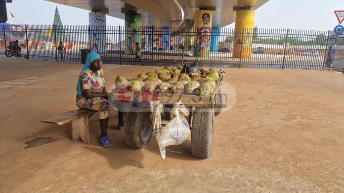 Coconut seller returns to her ‘old spot’ despite ban on container setup at Flower Pot Interchange