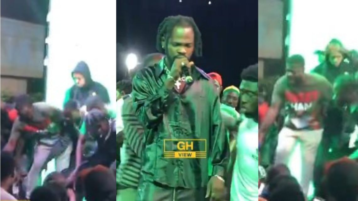 Fameye loses temper, misses a punch as party supporter misbehave on stage during NDC rally