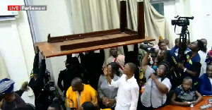 Pandemonium in Parliament: Tables uprooted to contest late-vetting of Ablakwa, Akandoh