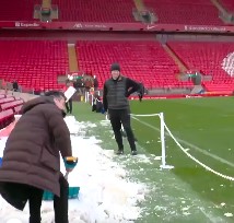 Video: See how Gary Neville tried to delay the Liverpool-Man Utd game by shoveling snow at Anfield