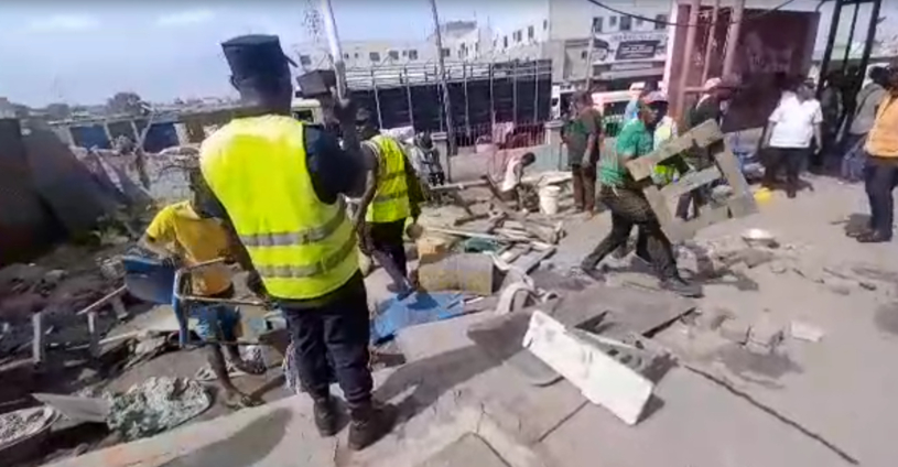 Squatters defy eviction at Neoplan bus stop