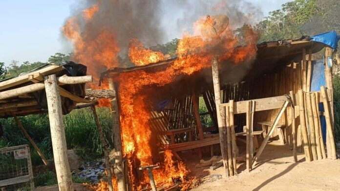 Illegal miners flee as NAIMOS raids “Yellow Face” site; dynamite, hard drugs found, structures set ablaze