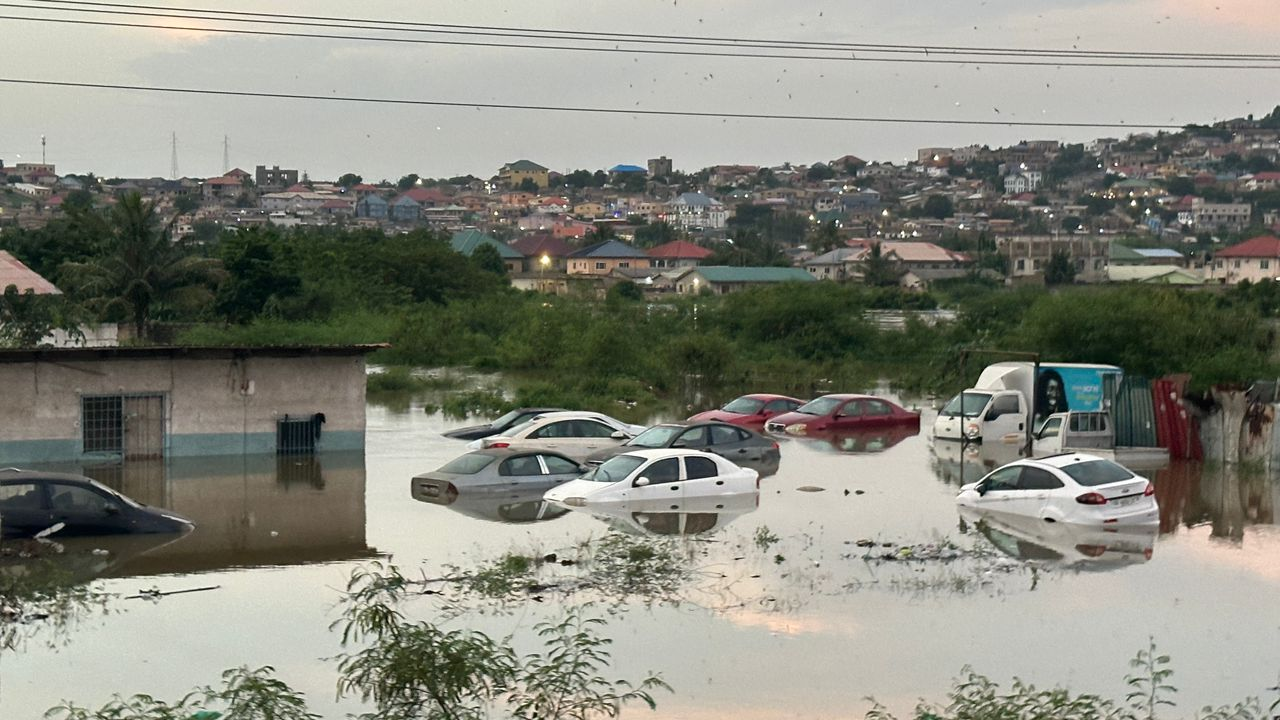 Pictures: Weija Dam spillage swallows houses, cars, displaces residents